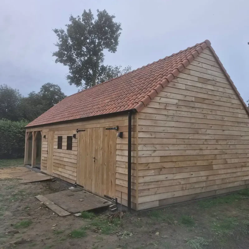 Houten bijgebouw in eik door houtconstructies Packet uit Diksmuide